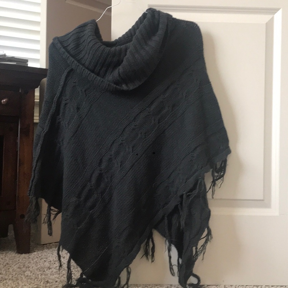 Dark grey poncho.